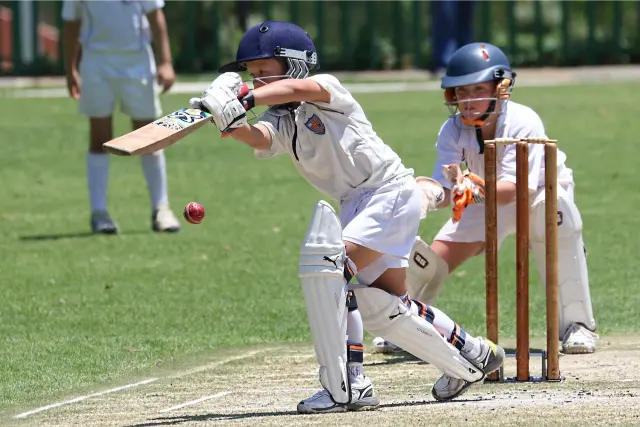 boys playing cricket